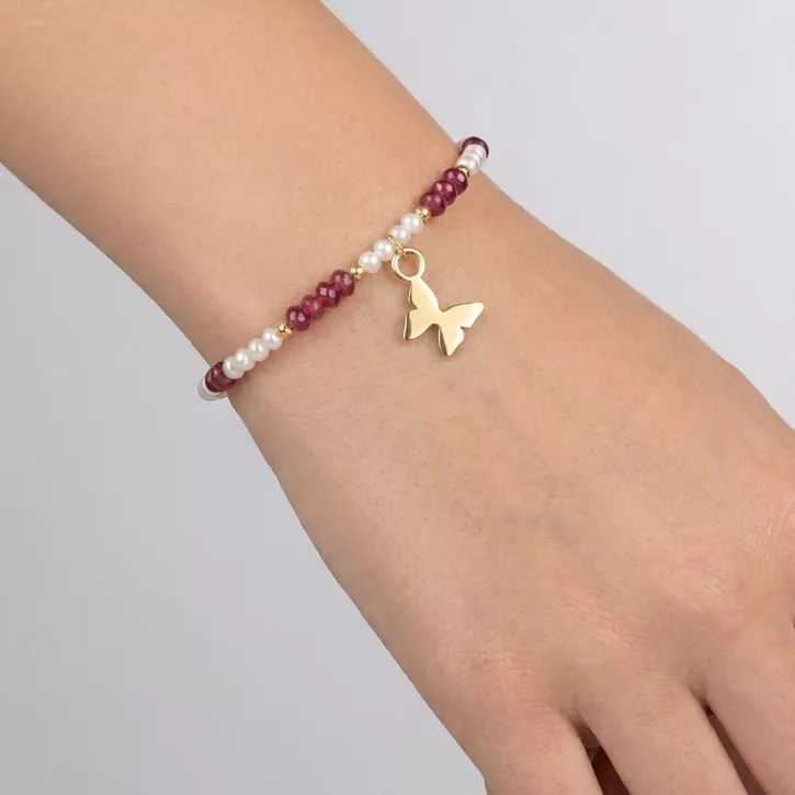 18kt gold baby bracelet with pearls and rubies.