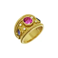 Byzantine 18kt yellow gold ring with oval rubellite, marquise sapphires, and six randomly placed diamond cups